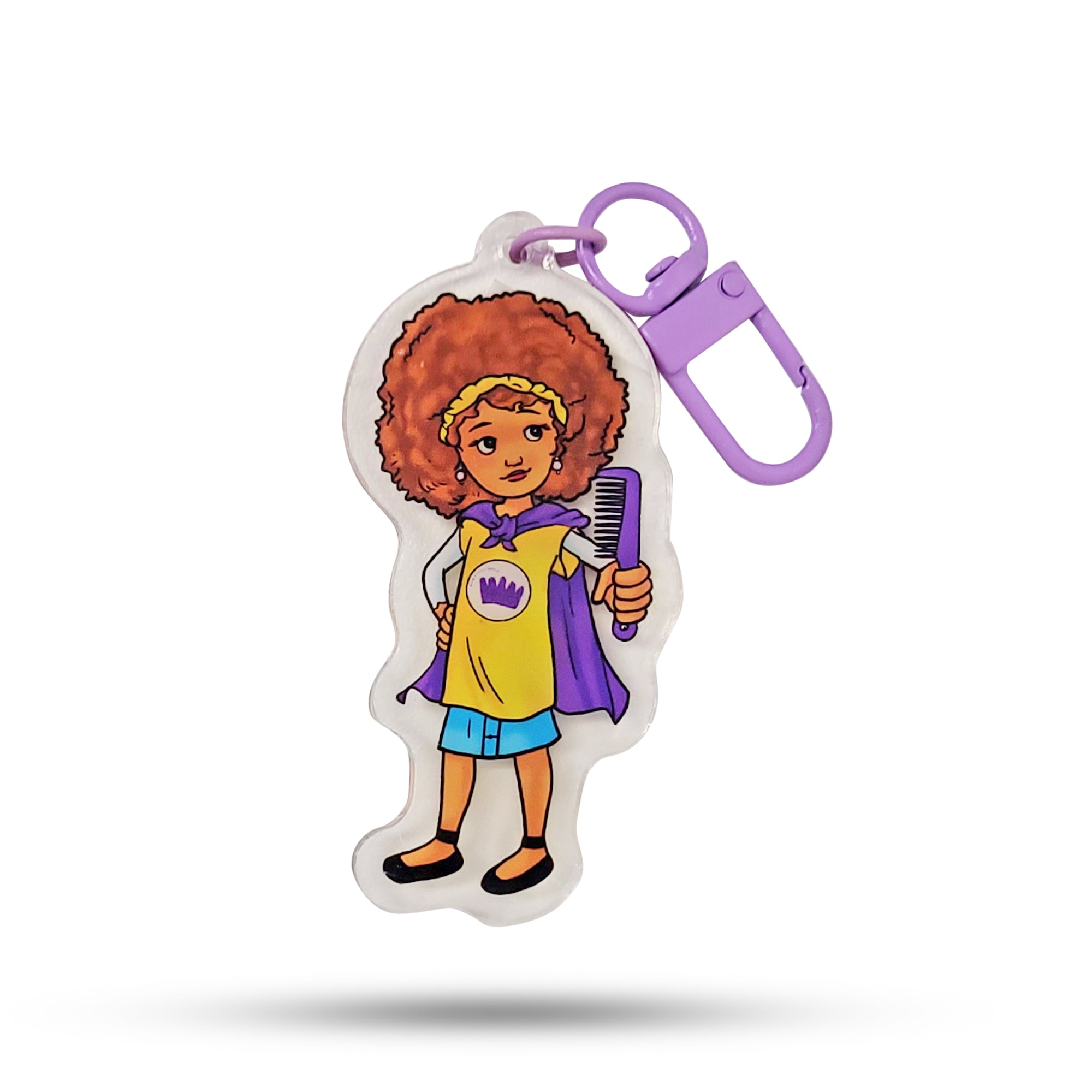 Keychain with cartoon character holding a comb on a white background
